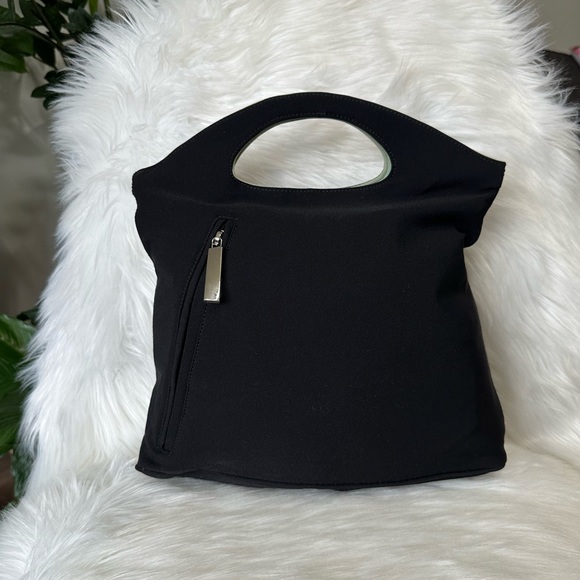 🔥BLACK FRIDAY SALE LIMITED TIME🔥
Authentic Salvatorre Ferragamo Reversible Bag - Picture 1 of 10